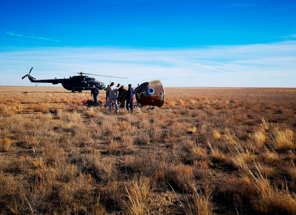 PHOTO: In this photo provided by Russian Defense Ministry Press Service, the rescue team gather next to the Soyuz MS-10 space capsule after it made an emergency landing in a field 280 miles northeast of Baikonur, Kazakhstan, Oct. 11, 2018. 