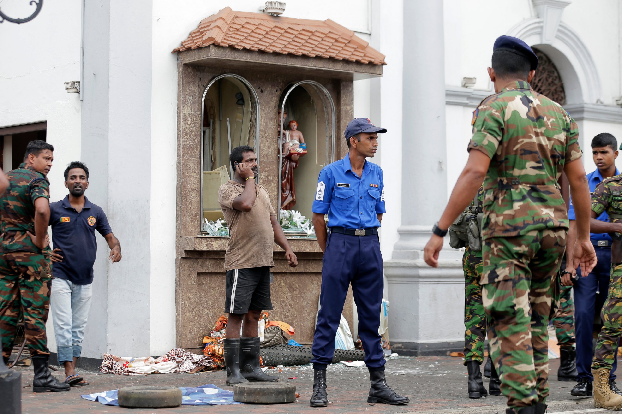 PHOTO: People gather outside St. Anthony's Shrine where a blast happened, in Colombo, Sri Lanka, Sunday, April 21, 2019. A Sri Lanka hospital spokesman says several blasts on Easter Sunday have killed dozens of people.