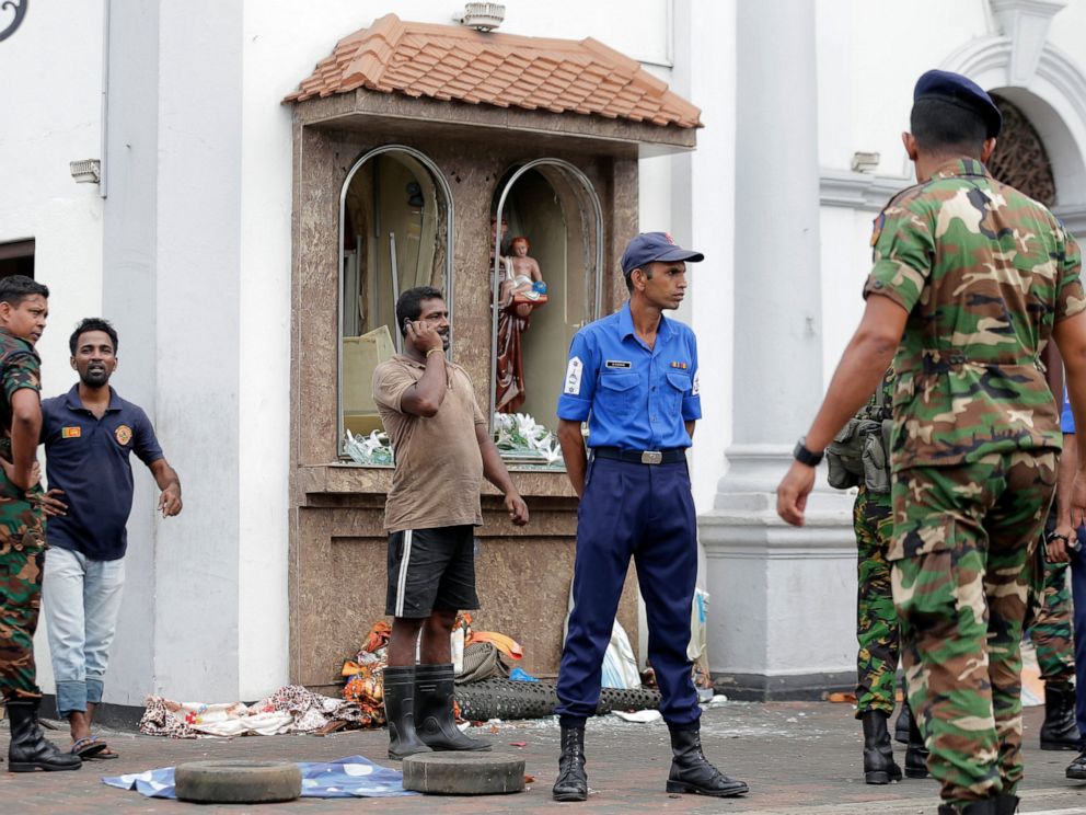 PHOTO: People gather outside St. Anthonys Shrine where a blast happened, in Colombo, Sri Lanka, Sunday, April 21, 2019. A Sri Lanka hospital spokesman says several blasts on Easter Sunday have killed dozens of people.
