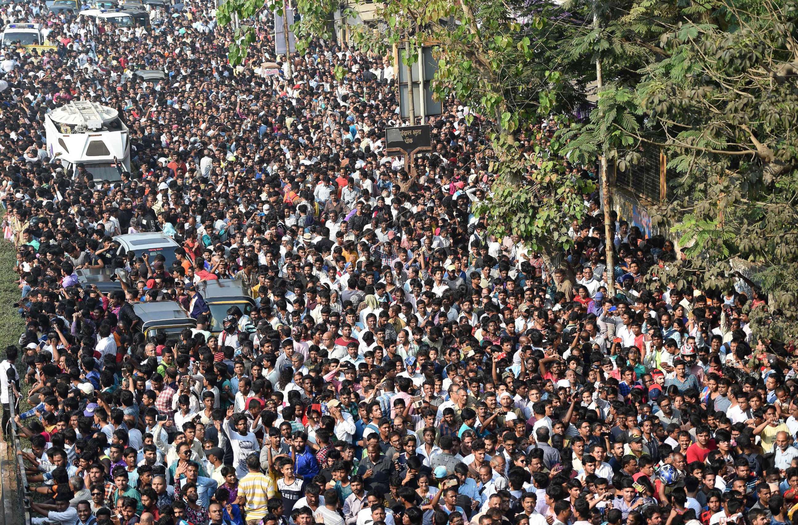 PHOTO: Crowds gather behind the funeral procession of Indian Bollywood actress Sridevi Kapoor in Mumbai, India, Feb 28, 2018.