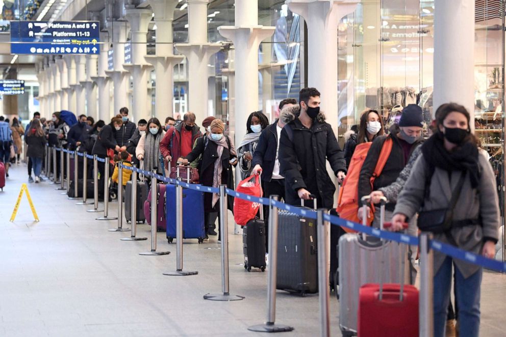 PHOTO: People at St Pancras station in London, wait to board the last train to Paris on Dec. 20, 2020.