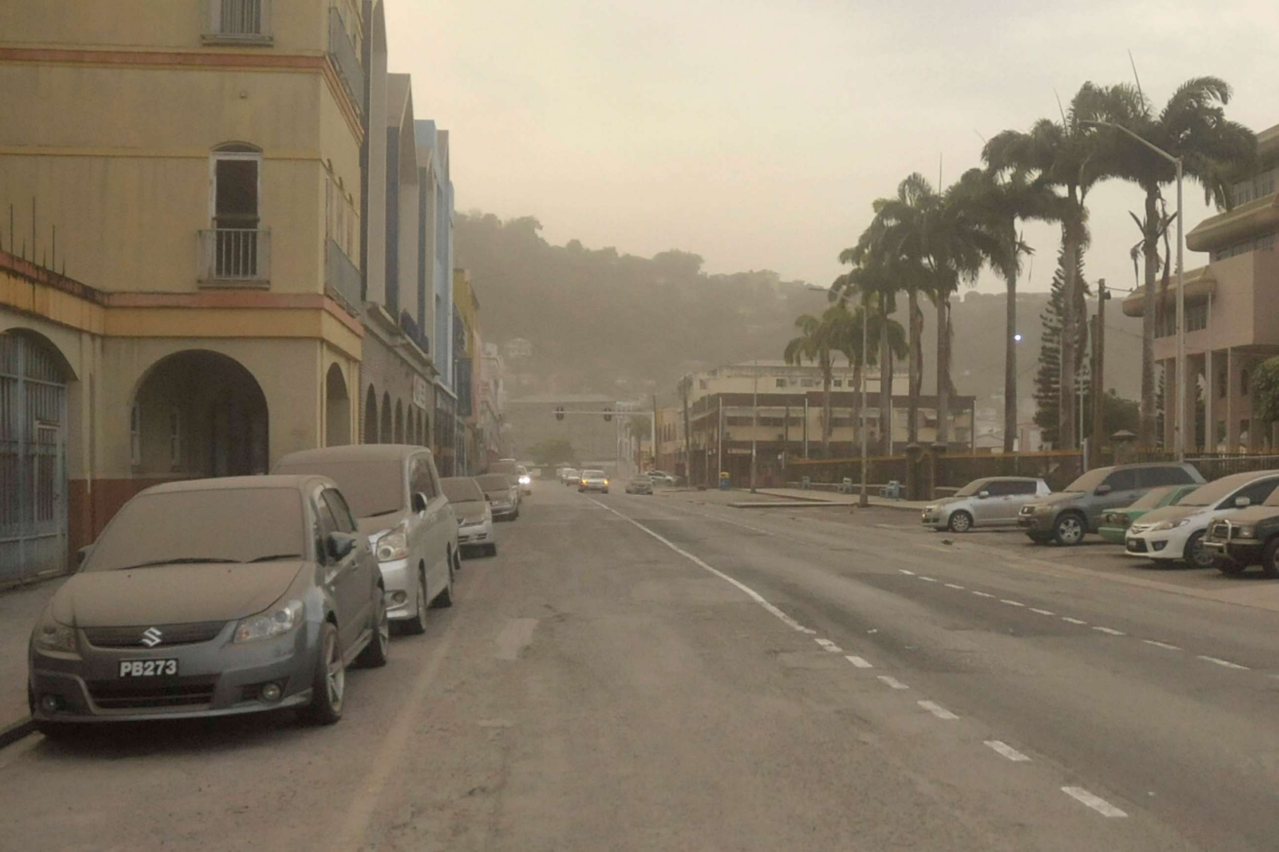 PHOTO: Ash covers roads a day after the La Soufriere volcano erupted after decades of inactivity, in Kingstown, St Vincent and the Grenadines April 10, 2021.