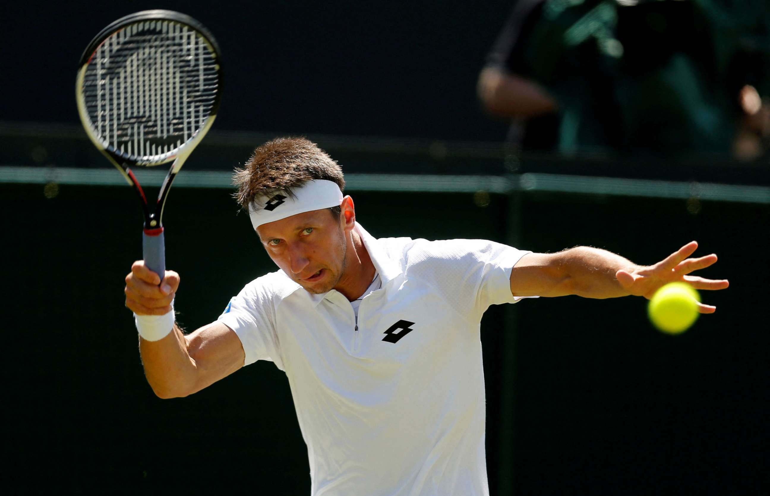PHOTO: Ukraine's Sergiy Stakhovsky in action during his second round match at Wimbledon in London, July 5, 2017.