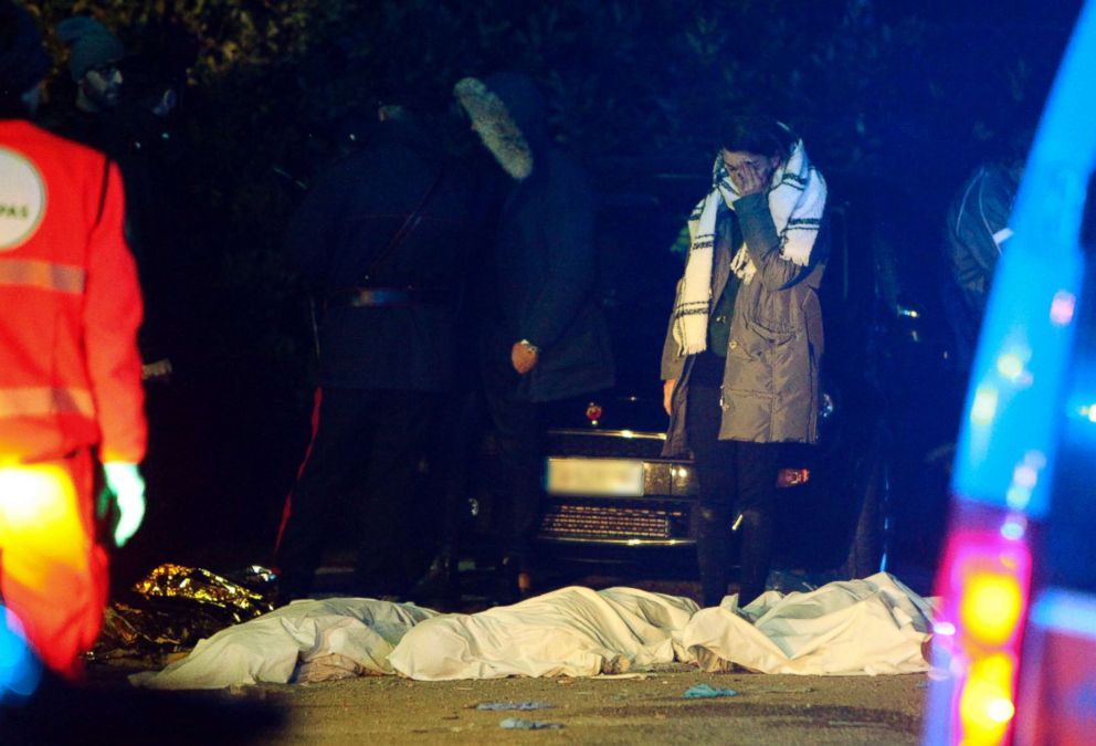 PHOTO: A girl cries as bodies lie on the ground outside the disco Lanterna Azzurra in Corinaldo, Italy, Saturday, Dec. 8, 2018.