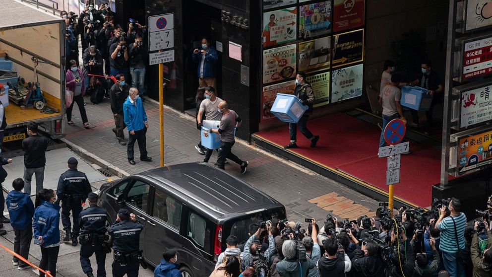 PHOTO: Boxes are loaded onto a truck from the offices of Stand News after police searched the premises of the independent news outlet, Dec. 29, 2021, in Hong Kong.
