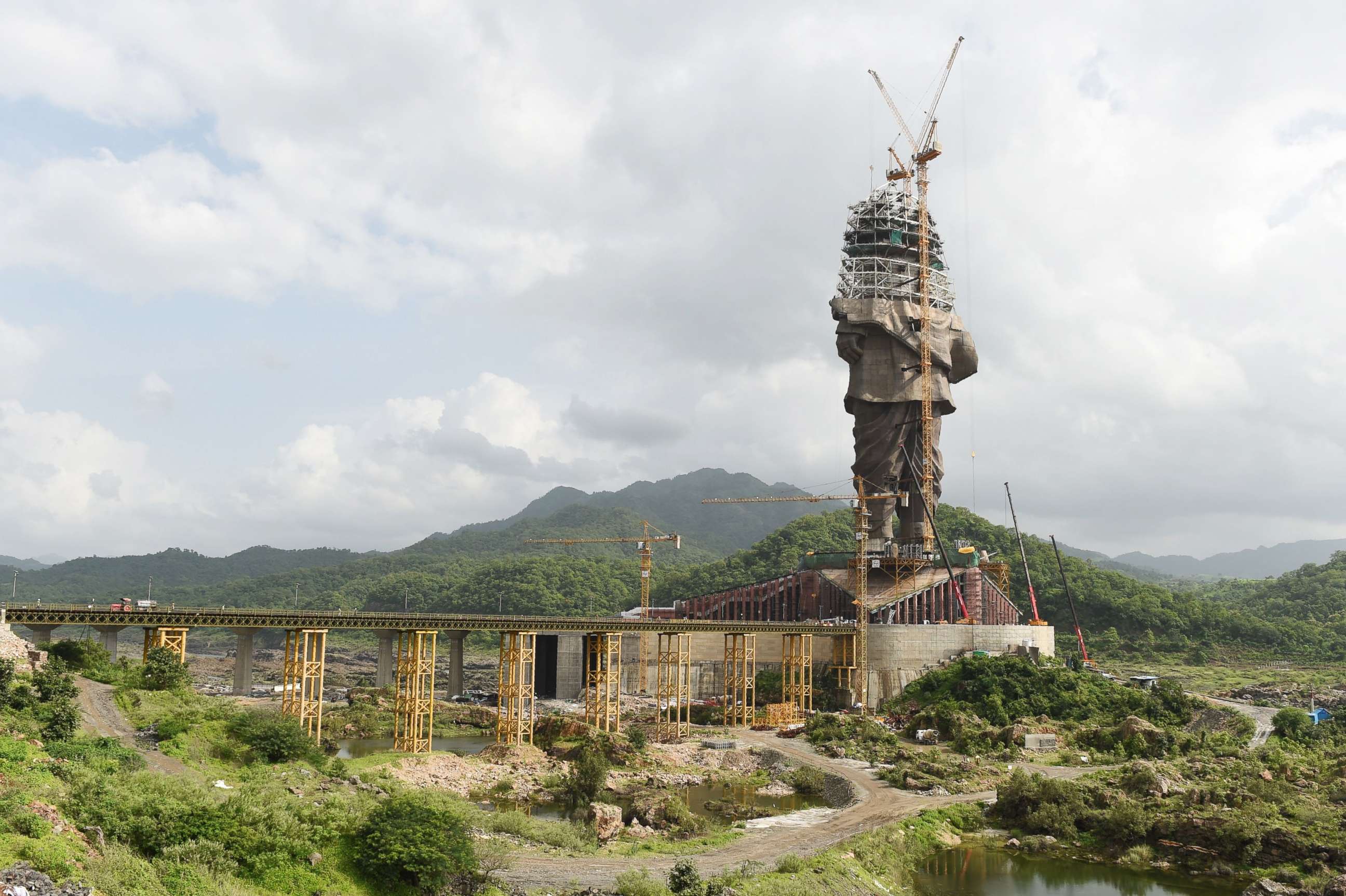 PHOTO: Indian workers carry on construction works at the 'Statue Of Unity,' a monument dedicated to Indian independence leader Vallabhbhai Patel, at Kevadiya Colony in the vicinity of Narmada Dam, Aug. 25, 2018, from Ahmedabad in Gujarat state.