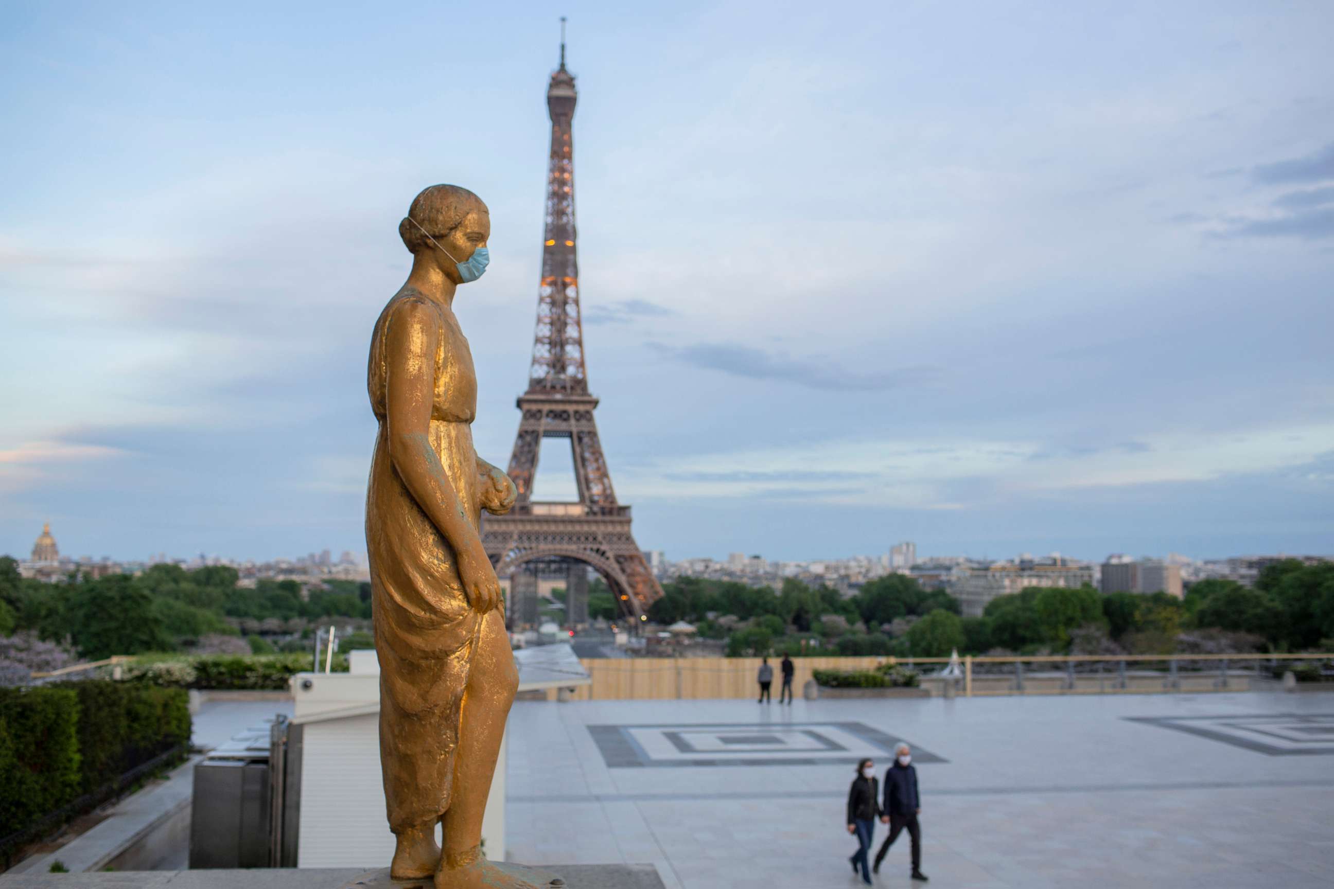 PHOTO: A statue wears a mask to encourage people to protect themselves against the spread of the novel coronavirus along the Trocadero square close to the Eiffel Tower in Paris, France, on May 2, 2020.