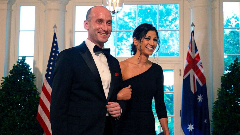 PHOTO: White House Senior Advisor Stephen Miller and Katie Waldman arrive in the Booksellers area of the White House to attend an Official Visit with a State Dinner honoring Australian Prime Minister Scott Morrison, in Washington, Sept. 20, 2019.