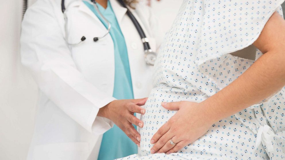 PHOTO: A stock photo of a doctor with a pregnant patient.