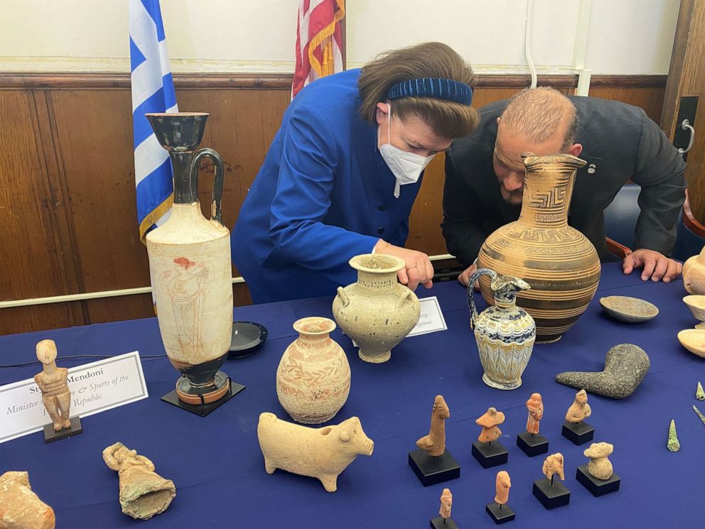 PHOTO: Greek Minister of Culture Lina Mendoni examines stolen antiquities at a repatriation ceremony at the Manhattan District Attorney's office in New York, on Feb. 23, 2022.
