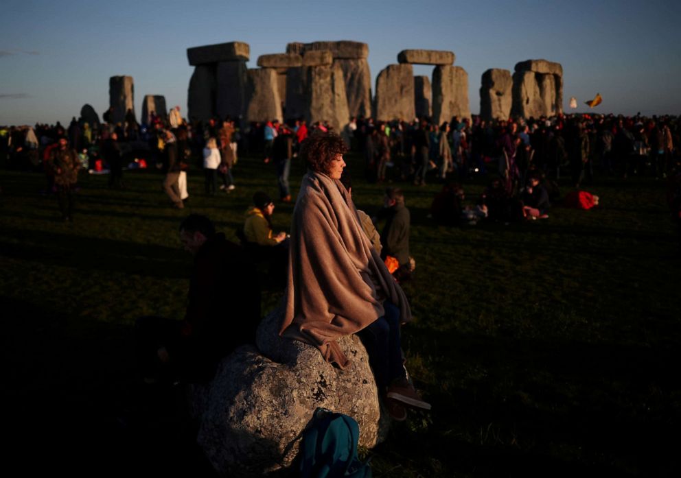 PHOTO: The sun rises as people welcome summer solstice at Stonehenge in Amesbury, England, June 21, 2019.