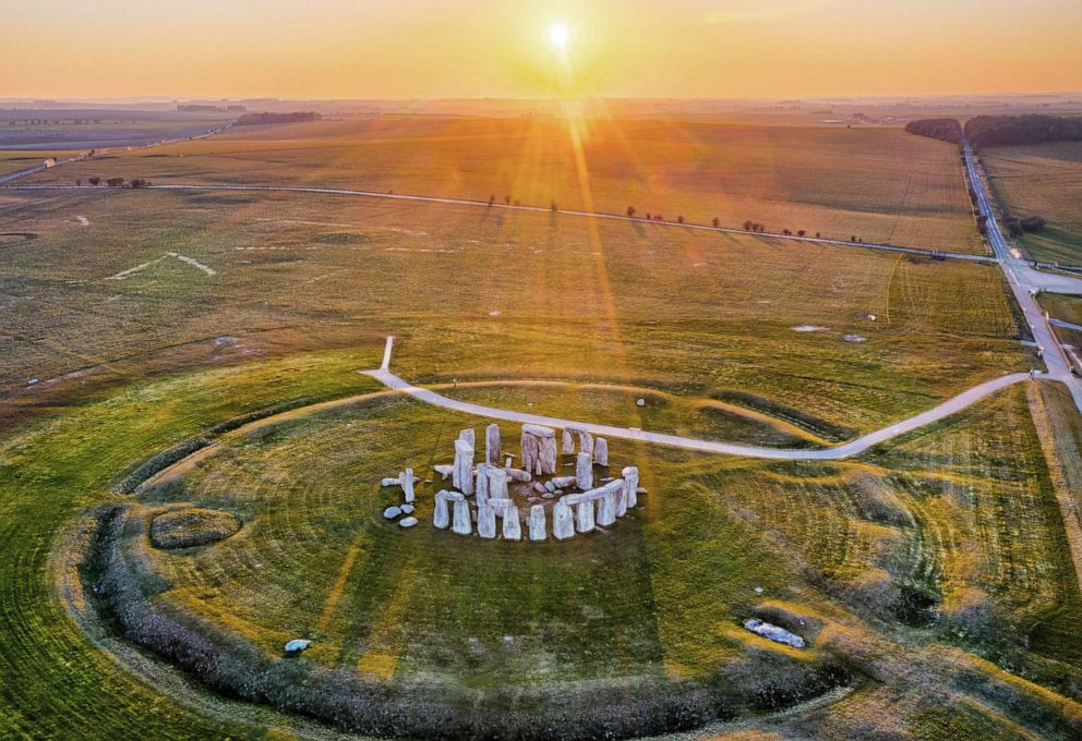 PHOTO: The sunset shines upon the Stonehenge monument in Wiltshire, England, March 26, 2020.