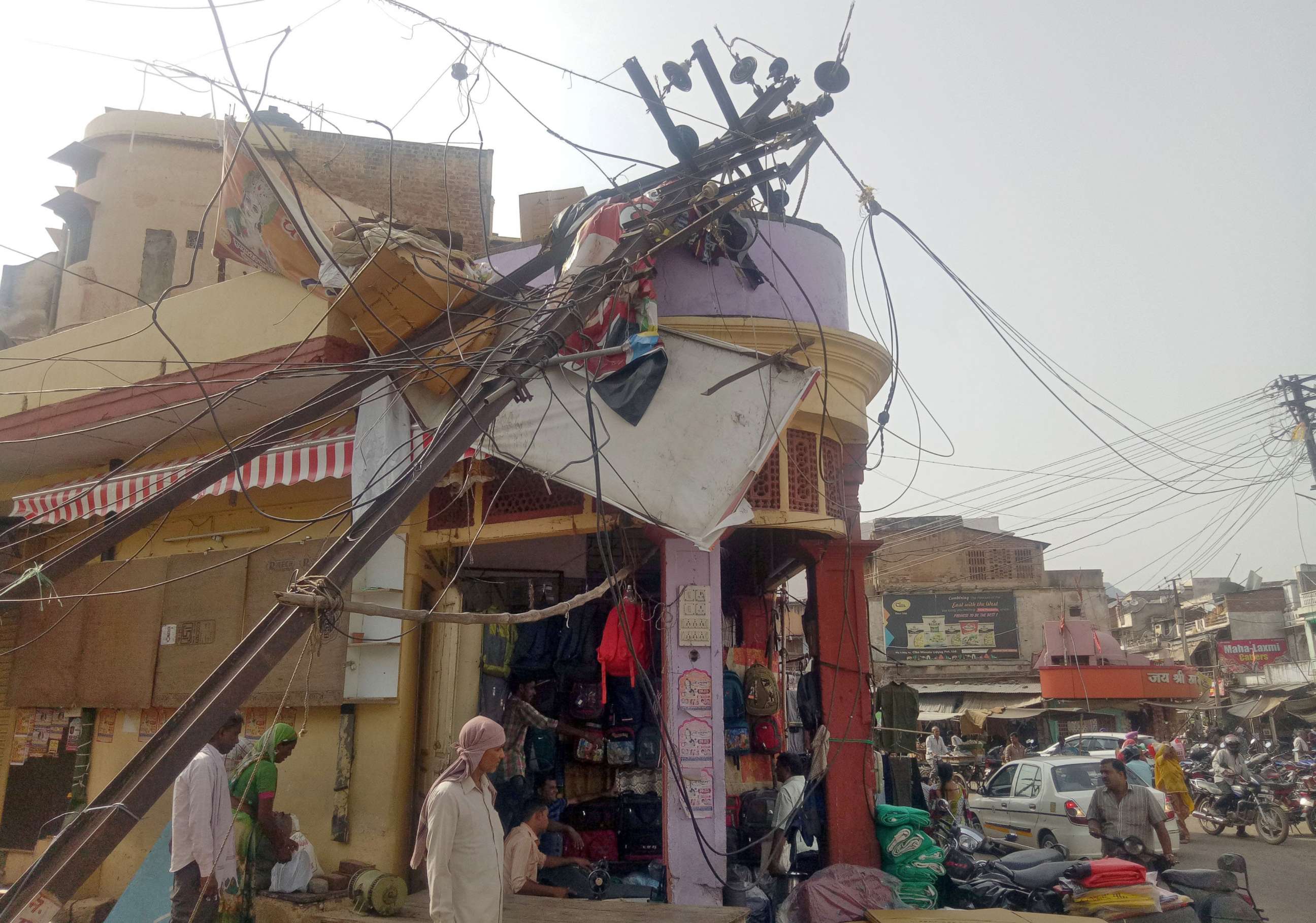 PHOTO: A damaged electric pole is pictured in a market after strong winds and dust storm in Alwar, in the western state of Rajasthan, India, May 3, 2018.