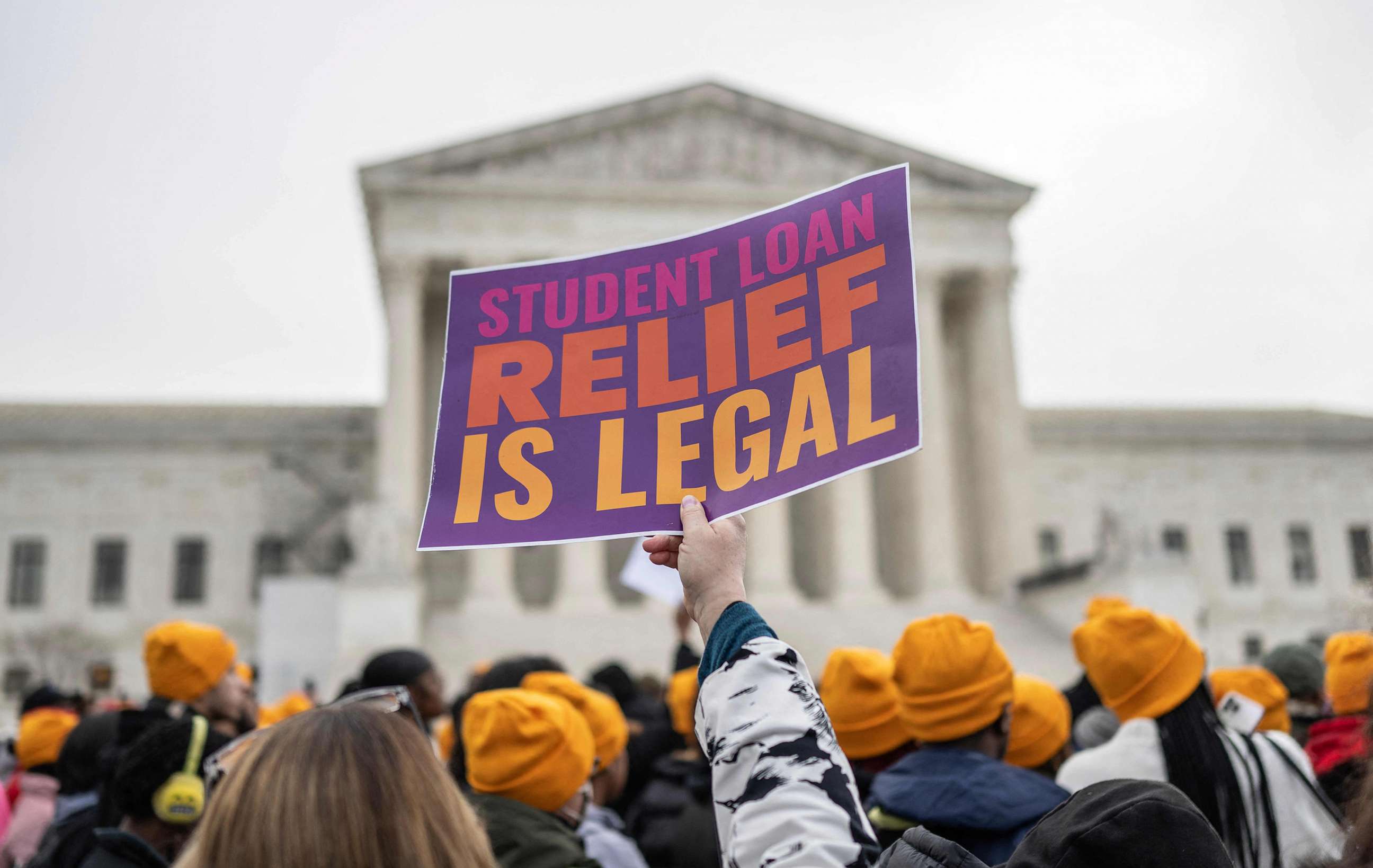 PHOTO: Activists and students show their support in front of the Supreme Court for student debt cancellation in Washington on Feb. 28, 2023.