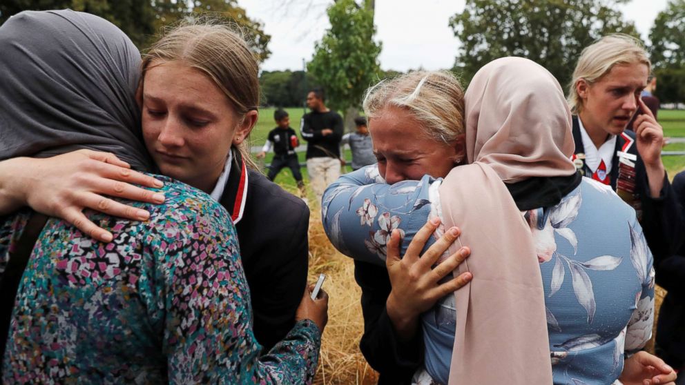 PHOTO: High school students from a Christian school give hugs to Muslims waiting for news of their relatives at a community center, in Christchurch, New Zealand, March 18, 2019.