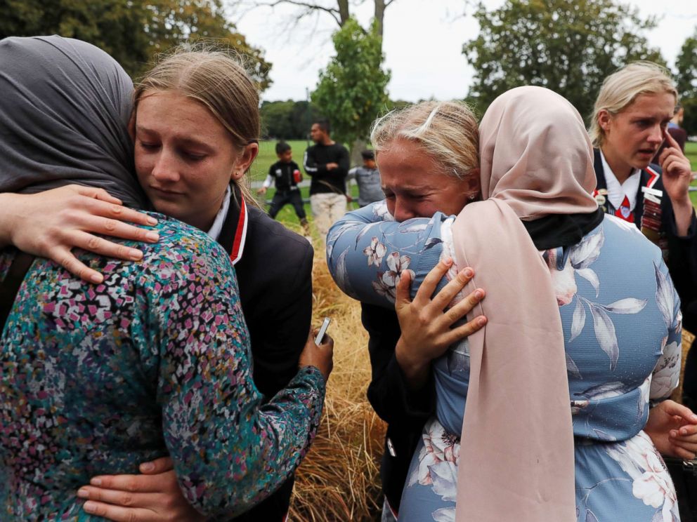 PHOTO: High school students from a Christian school give hugs to Muslims waiting for news of their relatives at a community center, in Christchurch, New Zealand, March 18, 2019.