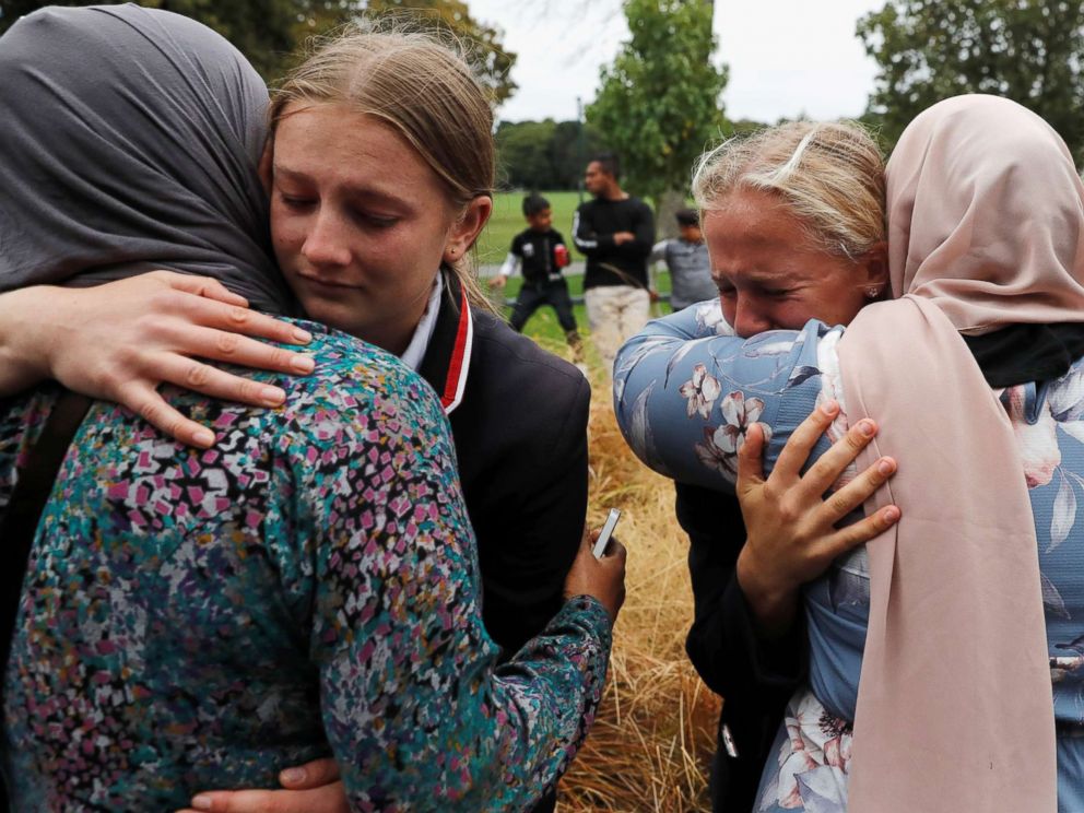 PHOTO: High school students from a Christian school give hugs to Muslims waiting for news of their relatives at a community center, in Christchurch, New Zealand, March 18, 2019.