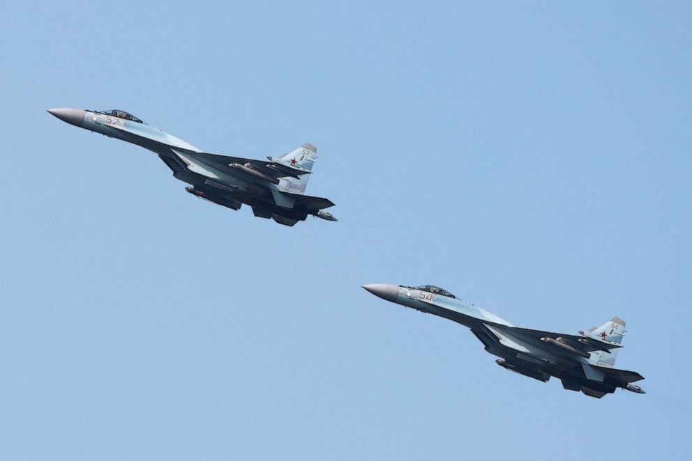 FILE PHOTO: Russian Sukhoi Su-35 jet fighters perform a flight during the Aviadarts competition, as part of the International Army Games 2021, at the Dubrovichi range outside Ryazan, Russia August 27, 2021.