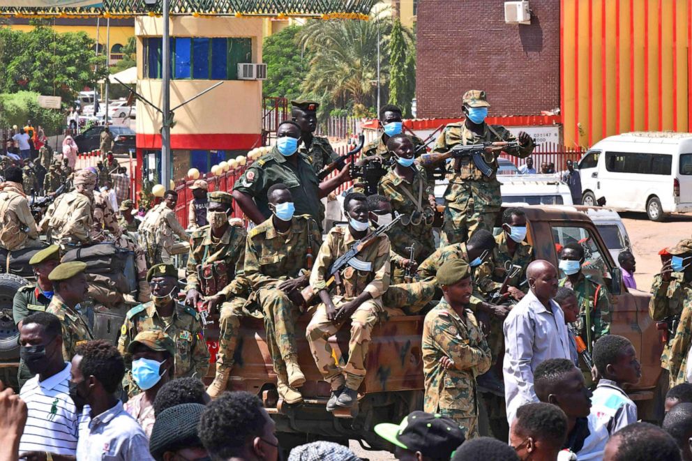 PHOTO: Sudanese security forces keep watch as they protect a military hospital and government offices during protests against a military coup overthrowing the transition to civilian rule on Oct. 25, 2021 in Omdurman, Sudan.