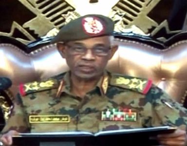 PHOTO: A grab from a live broadcast on Sudan TV shows Sudanese Defence Minister Ahmed Awad Ibnouf delivering a speech in Khartoum, announcing that President Omar al-Bashir was removed from power on April 11, 2019.
