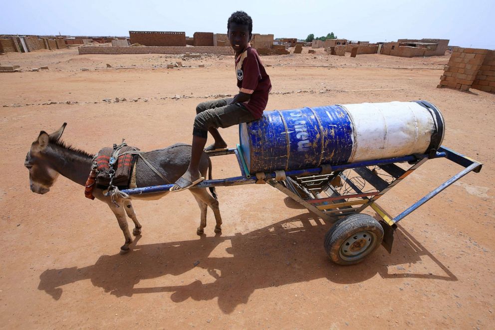 PHOTO: A member of a Sudanese family beneficiary of a cash support system is pictured in Khartoum, July 9, 2020.