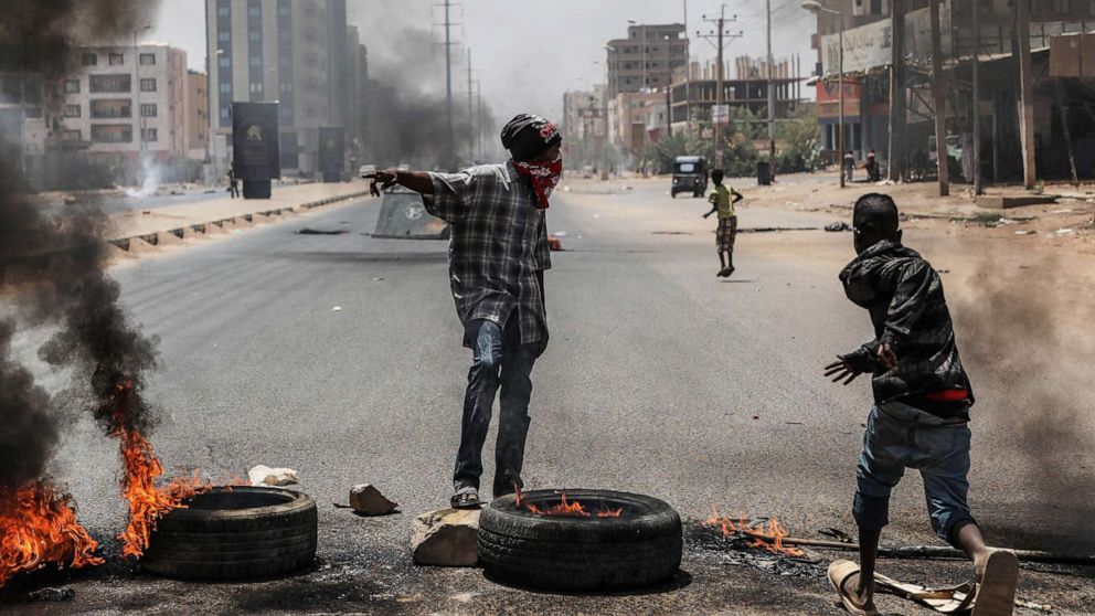 PHOTO: Sudanese protesters burn tires and set up barricades on roads to the army headquarters after the intervention of Sudanese army during a demonstration in Khartoum, Sudan on June 3, 2019.