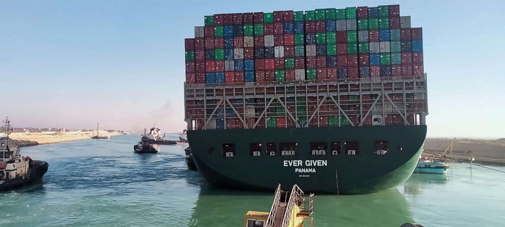 PHOTO: A picture taken on March 29, 2021 from a nearby tugboat in the Suez Canal shows a view of the Panama-flagged MV 'Ever Given' container ship as it begins to move.