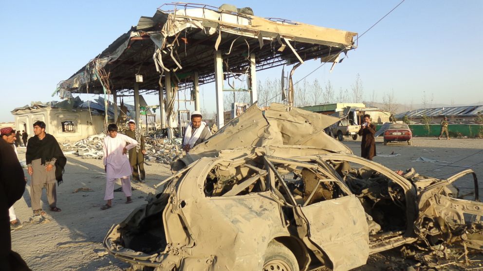 PHOTO: People survey the destruction caused at the scene of a suicide bomb attack that targeted a Police post, in Paktia, Afghanistan, Oct. 17, 2017.