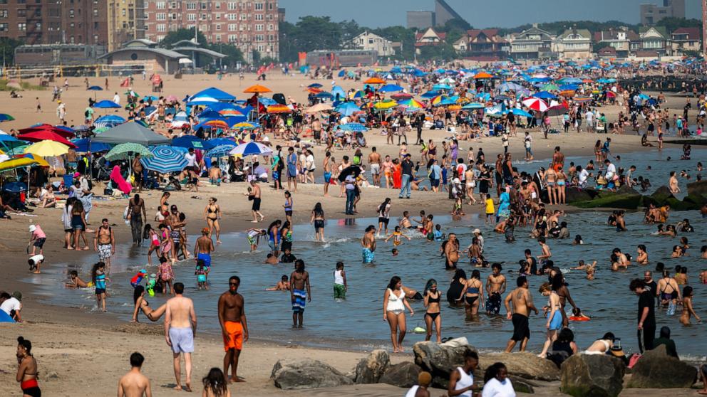 PHOTO: People try to stay cool at the beach at Coney Island in Brooklyn as the region experiences another heatwave on July 30, 2025 in New York City.