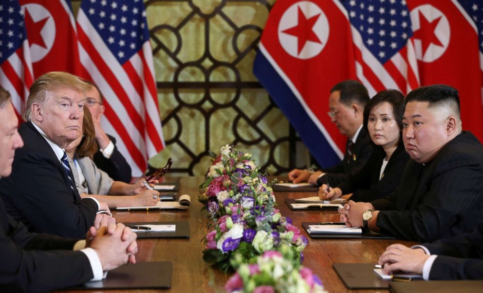 PHOTO: North Korea's leader Kim Jong Un and President Donald Trump look on during the extended bilateral meeting in the Metropole hotel during the second North Korea-U.S. summit in Hanoi, Vietnam, Feb. 28, 2019. 