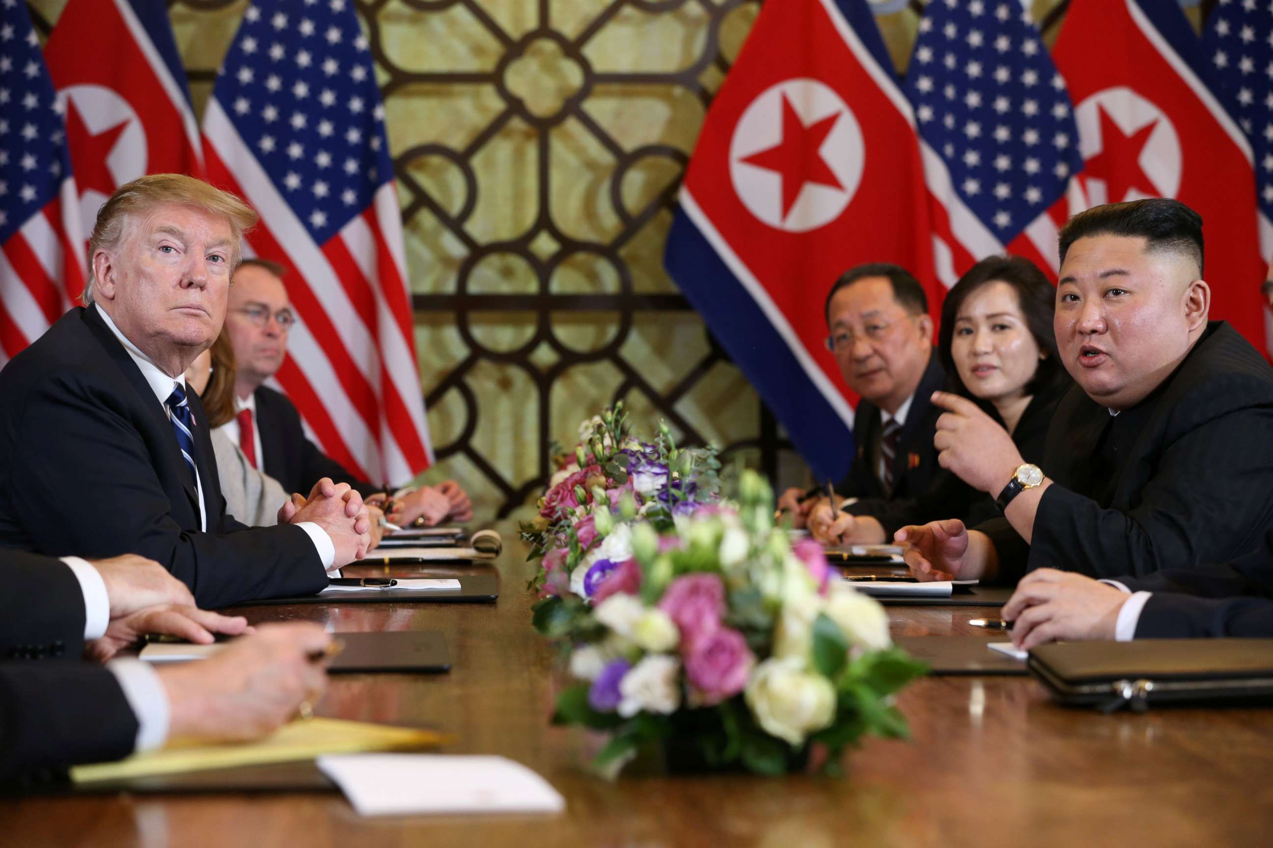 PHOTO: North Korea's leader Kim Jong Un speaks as President Donald Trump looks on during the extended bilateral meeting in the Metropole hotel during the second North Korea-U.S. summit in Hanoi, Vietnam, Feb. 28, 2019.