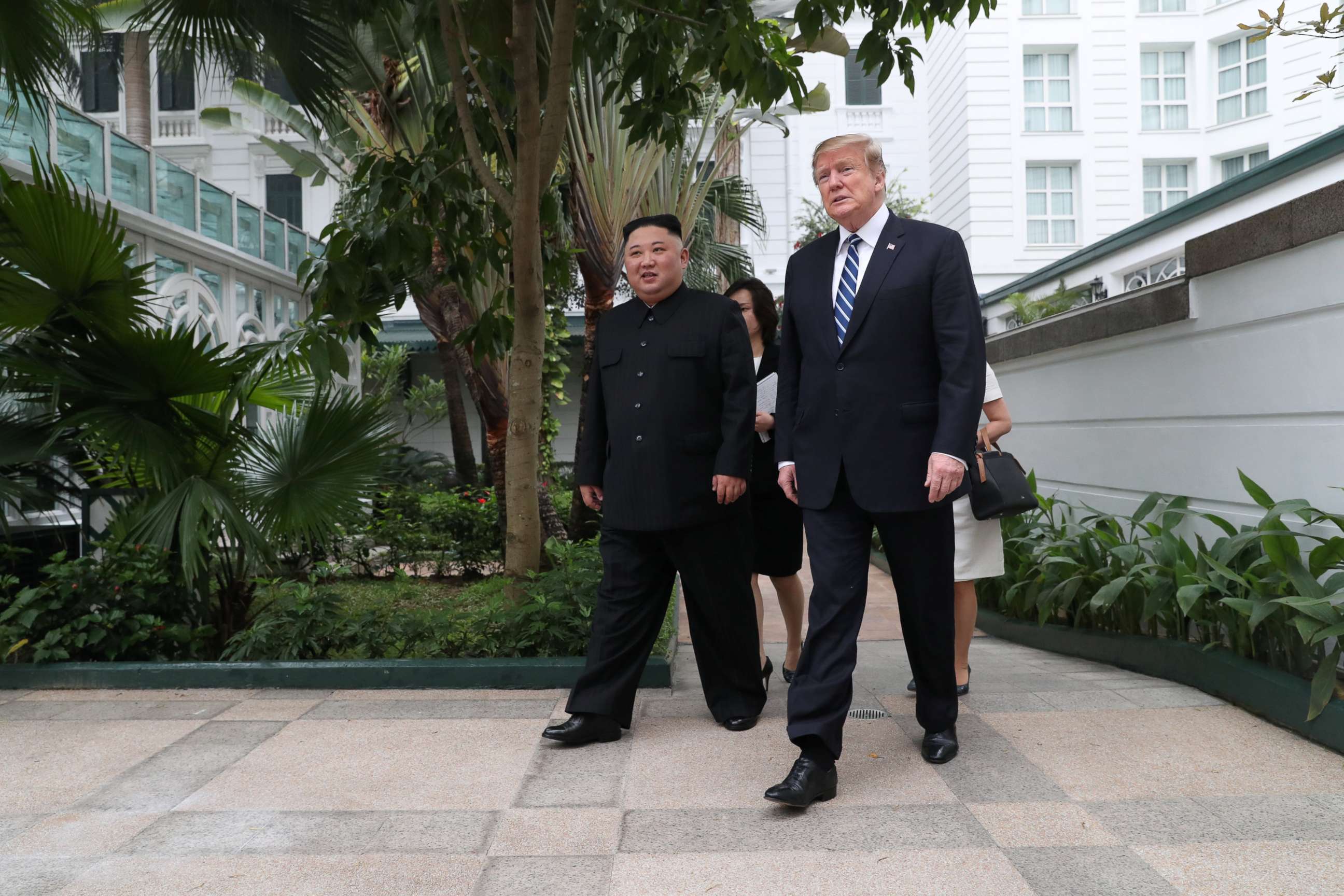 PHOTO: President Donald Trump and North Korea's leader Kim Jong Un walk in the garden at the Metropole hotel during the second North Korea-U.S. summit in Hanoi, Vietnam, Feb. 28, 2019. 