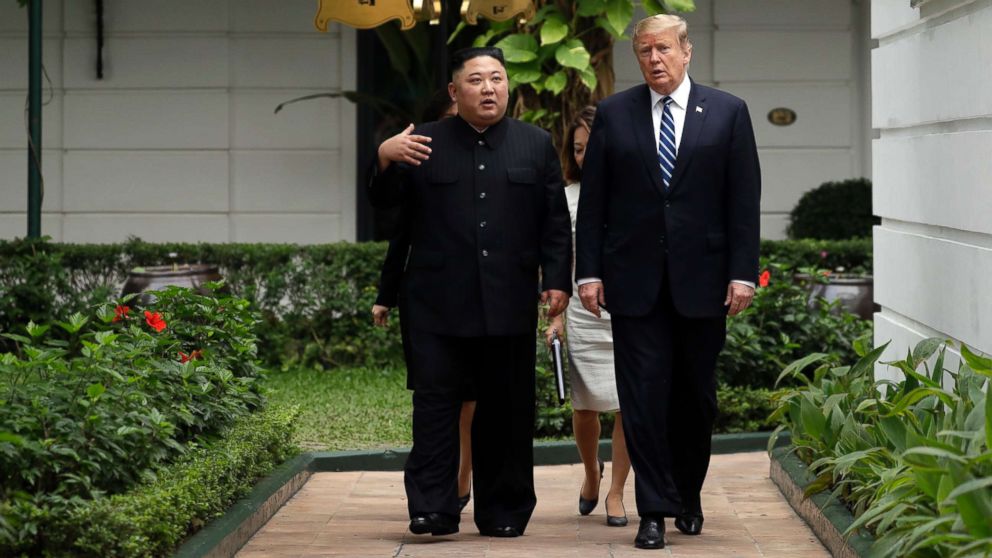 PHOTO: President Donald Trump and North Korean leader Kim Jong Un take a walk after their first meeting at the Sofitel Legend Metropole Hanoi hotel, Feb. 28, 2019, in Hanoi.