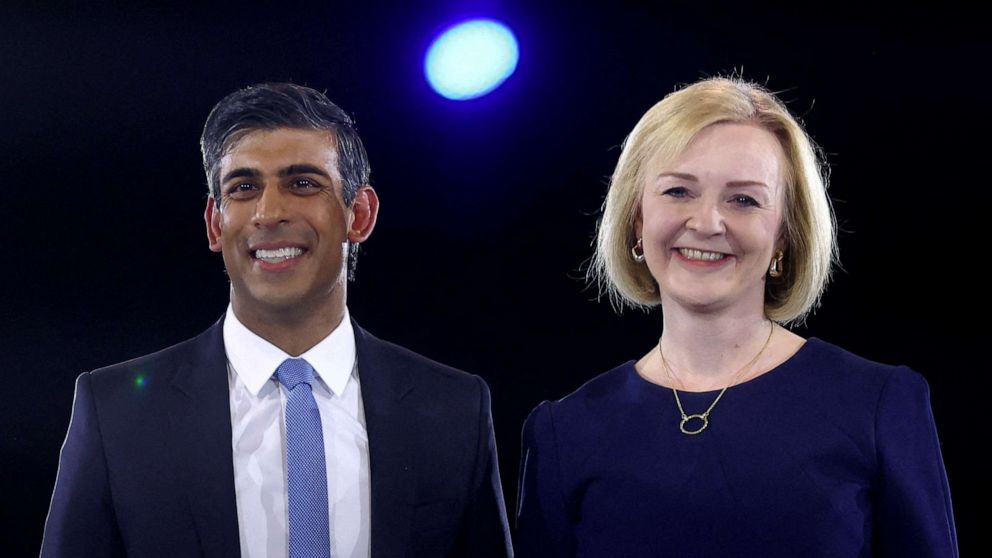 PHOTO: Conservative leadership candidates Liz Truss and Rishi Sunak stand together as they attend a hustings event, part of the Conservative party leadership campaign, in London, Britain August 31, 2022.