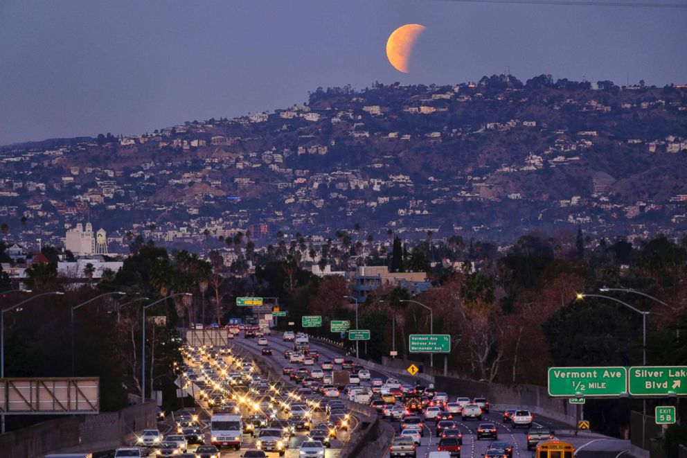 PHOTO: A super blue blood moon sets behind the Hollywood hills in Los Angeles, Jan. 31, 2018. 
