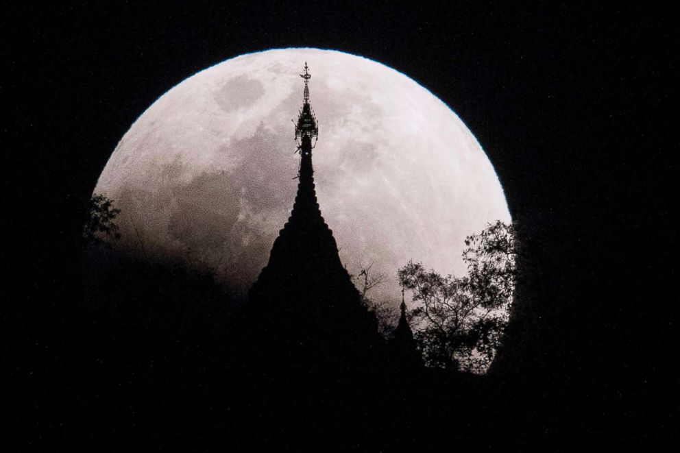 PHOTO: The moon rises over a pagoda in Kumal, some 65 miles away from Mandalay City, Myanmar, on Jan. 31, 2018. 

