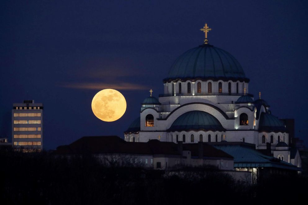 PHOTO: A full moon rises behind St. Sava temple in Belgrade, Serbia, on Jan 31, 2018.