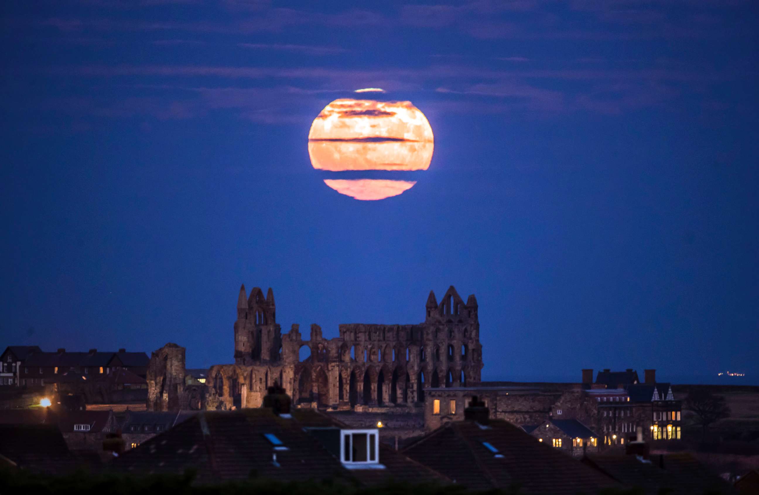 PHOTO: The Supermoon rises above Whitby Abbey in Whitby, north east England, Sunday Dec. 3, 2017.