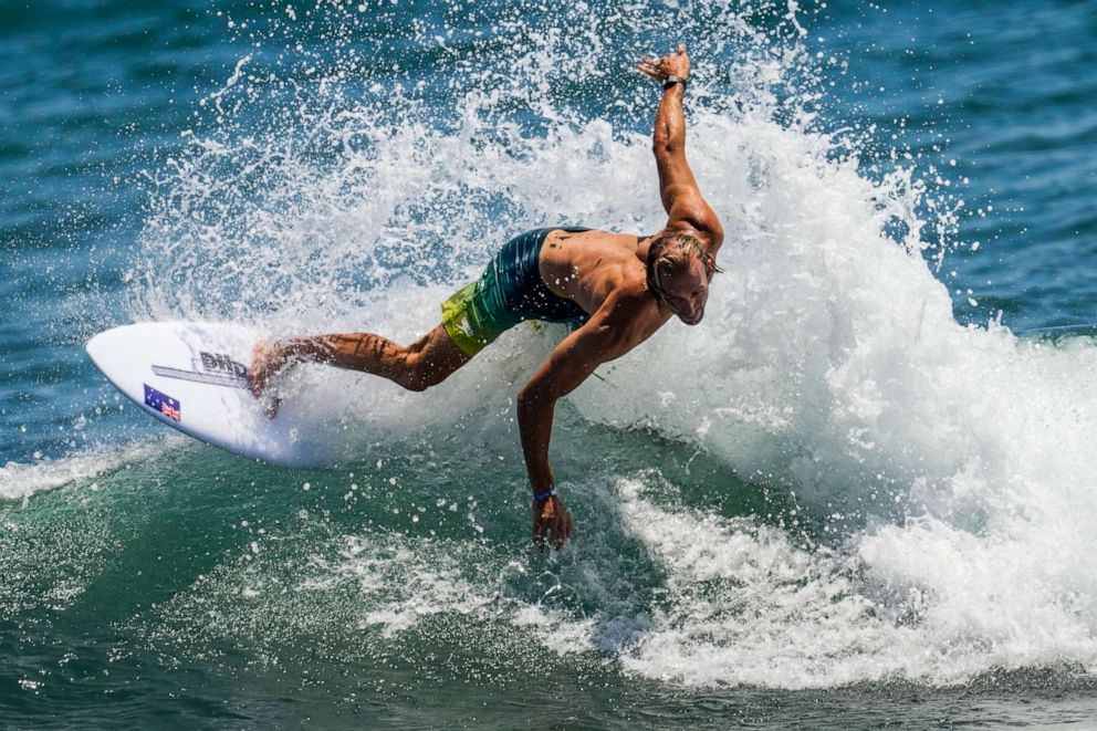 PHOTO: Australia's Owen Wright rides a wave during a training session at the 2020 Summer Olympics, Thursday, July 22, 2021, at Tsurigasaki beach in Ichinomiya, Japan.