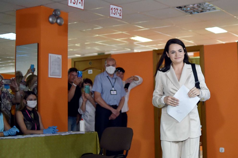 PHOTO: In this file photo taken on Aug. 9, 2020, presidential candidate Svetlana Tikhanovskaya walks to cast her ballot at a polling station during the presidential election in Minsk.