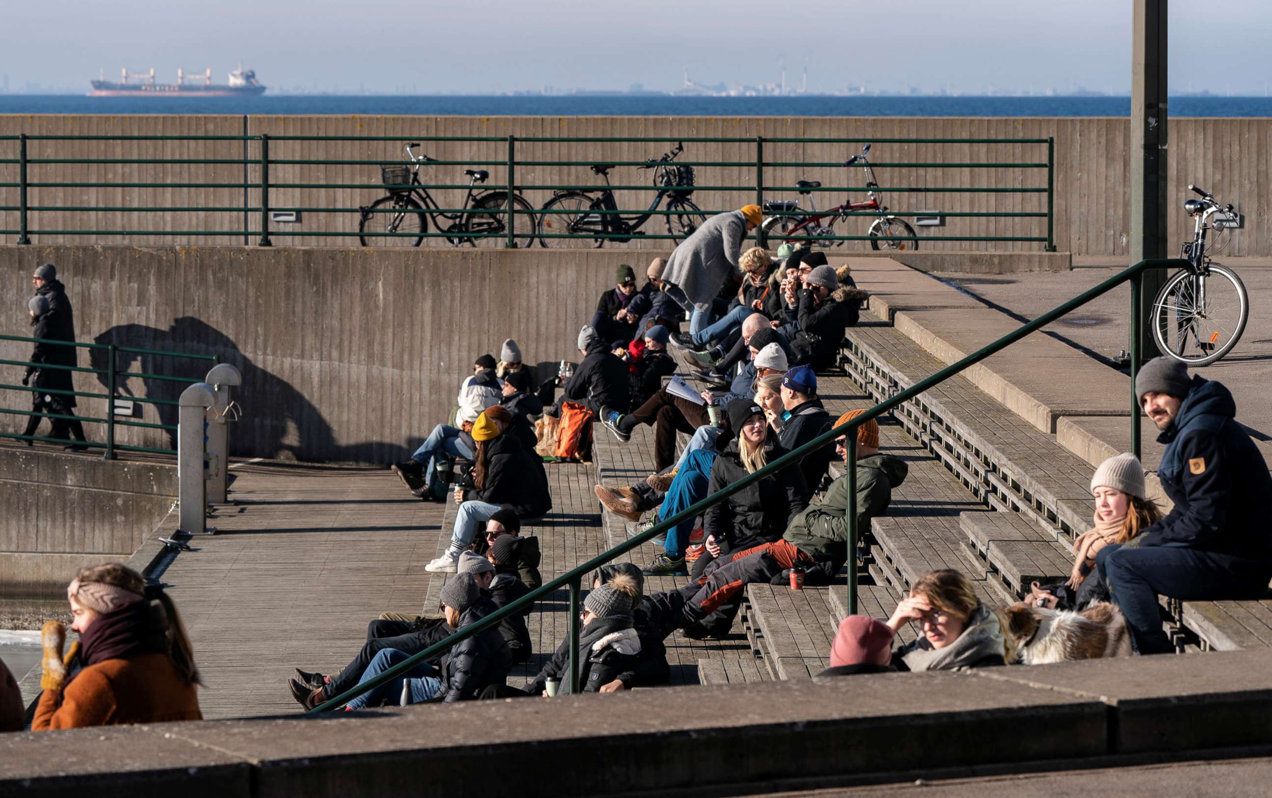 PHOTO: People enjoy a sunny winter day in Malmo, Sweden, on Feb. 14, 2021.
