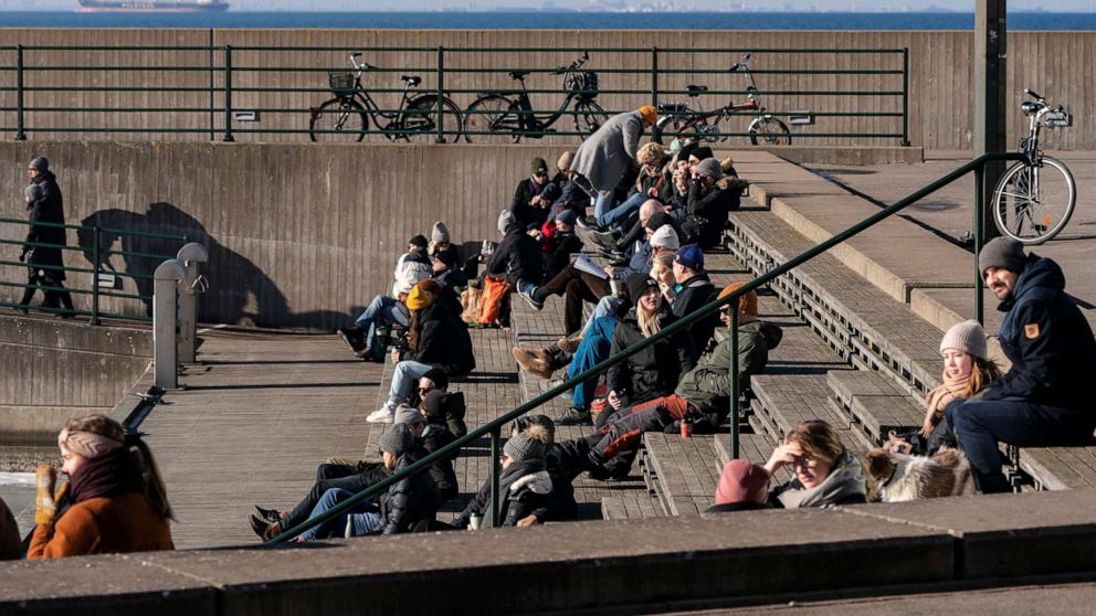 PHOTO: People enjoy a sunny winter day in Malmo, Sweden, on Feb. 14, 2021.