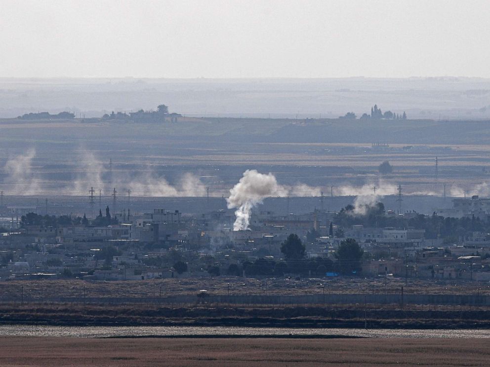 PHOTO: This picture taken on October 18, 2019 from the Turkish side of the border in Ceylanpinar shows smoke rising from the Syrian town of Ras al-Ain on the first week of Turkeys military operation against Kurdish forces.