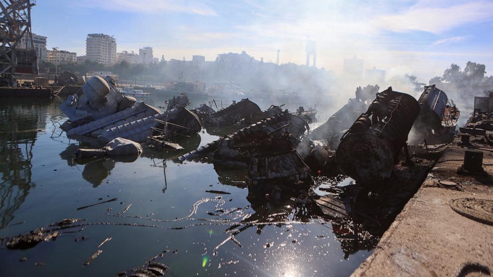 PHOTO: Smoke billows from Syrian naval ships destroyed in an overnight Israeli attack on the port city of Latakia, Dec. 10, 2024.