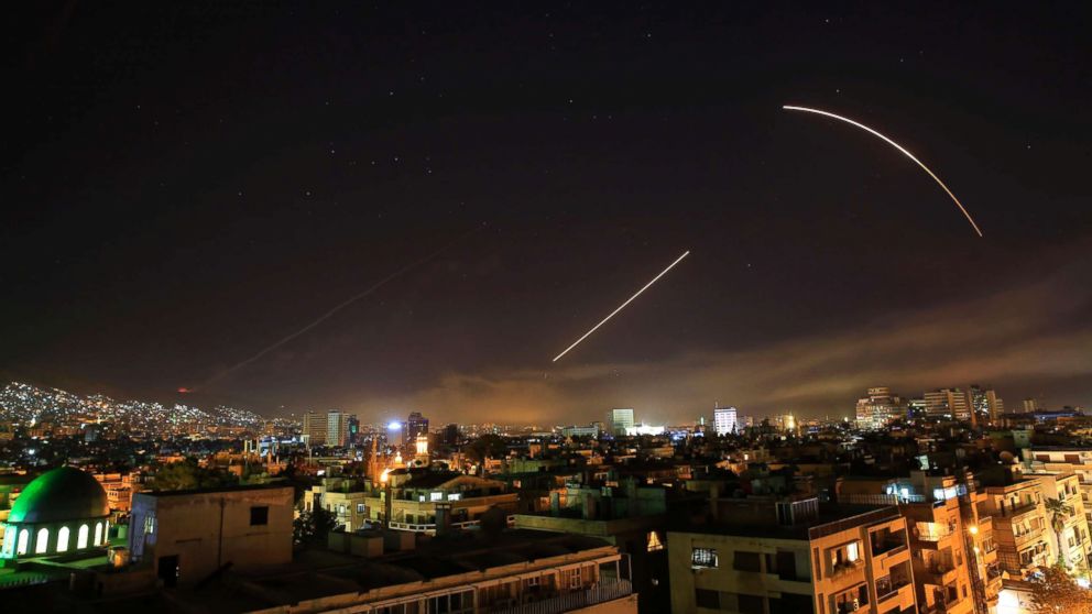PHOTO: Missiles streak across the Damascus skyline as the U.S. launches an attack on Syria targeting different parts of the capital, early Saturday, April 14, 2018.