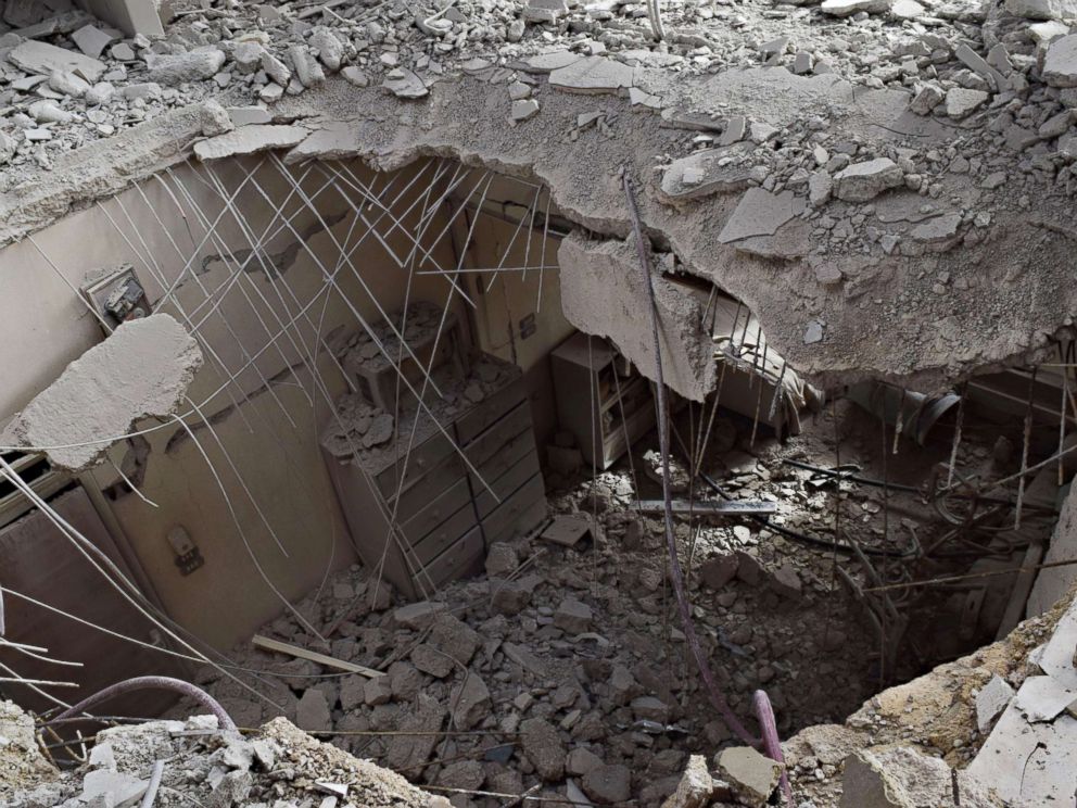 PHOTO: Photo taken Jan. 22, 2018 shows destruction caused by explosions and shelling in civilian property in a residential neighborhood in the suburbs of Damascus.