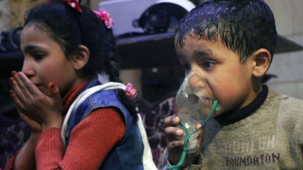 PHOTO: This image released early Sunday, April 8, 2018 by the Syrian Civil Defense White Helmets, shows a child receiving oxygen through respirators following an alleged poison gas attack in the rebel-held town of Douma, near Damascus, Syria.