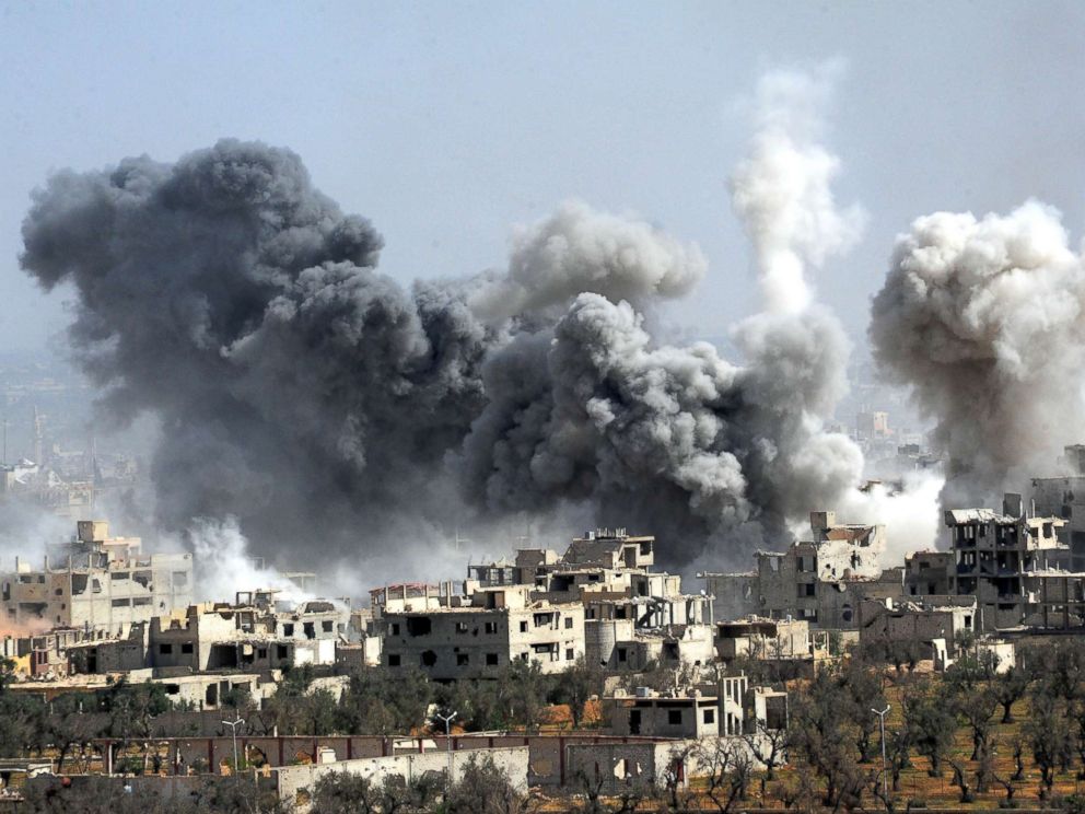 PHOTO: Smoke rises after the Syrian armys shelling targeted the Douma district in Eastern Ghouta countryside of Damascus, Syria, April 7, 2018.