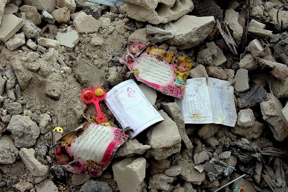 PHOTO: School books and certificates found by White Helmets member lay on the rubble, in the aftermath of an earthquake, in rebel-held town of Jandaris, Syria, Feb. 10, 2023.