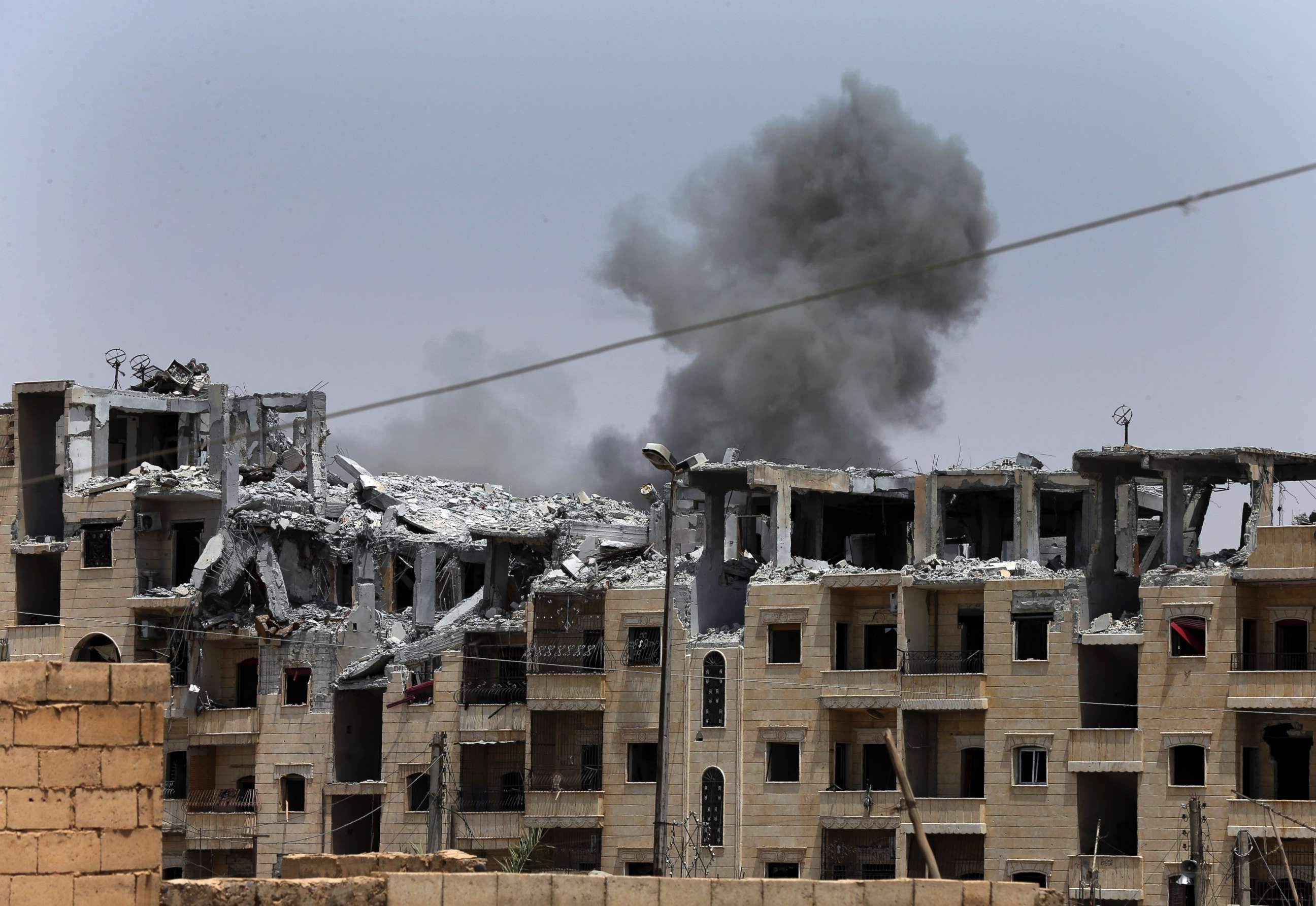 PHOTO: Smoke rises from a coalition airstrike which attacked an Islamic State position, on the front line on the western side of Raqqa, northeast Syria, July 17, 2017. 